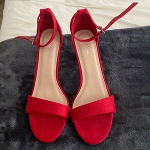Red velour ankle strap heels